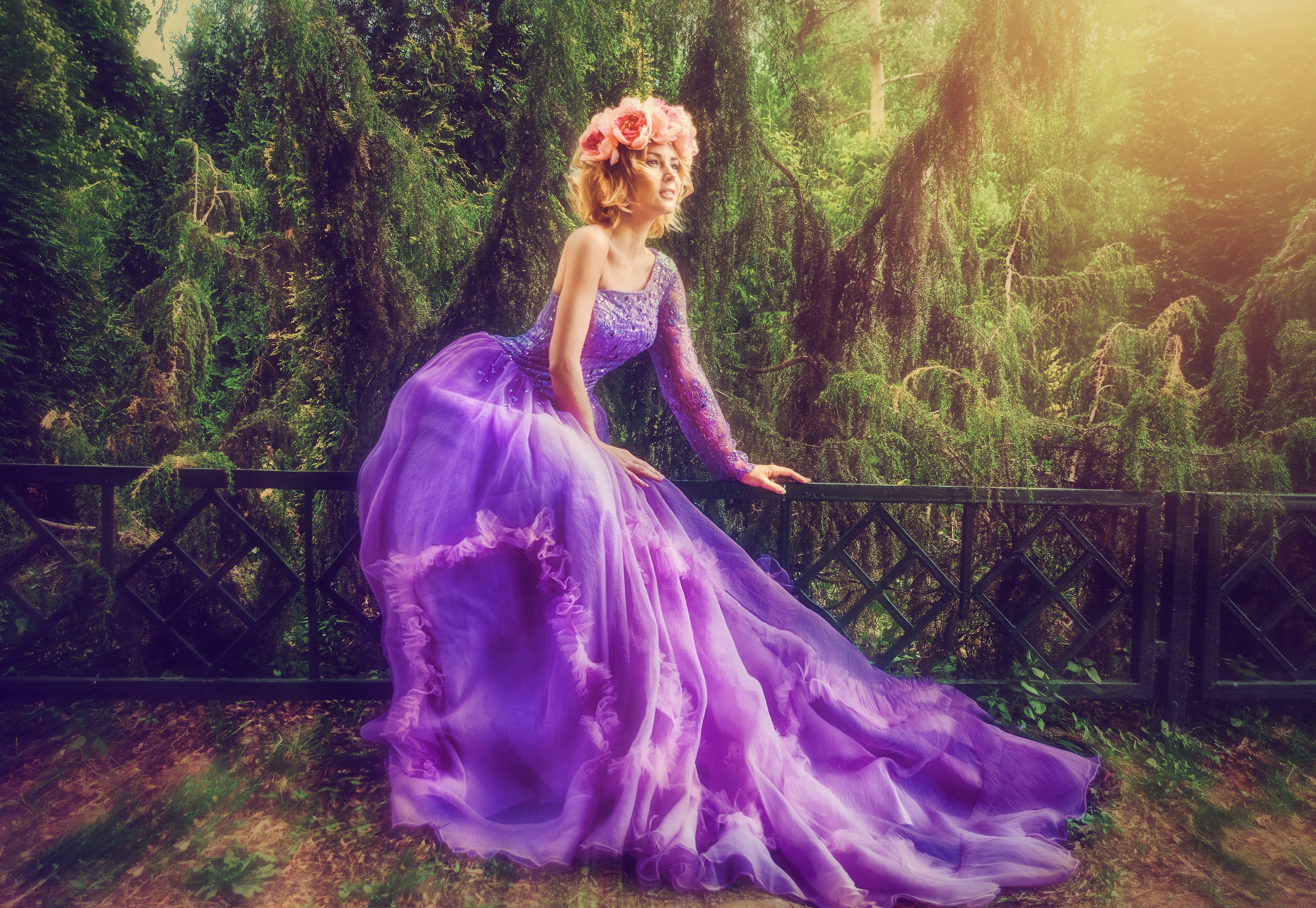 woman wearing purple dress in forest